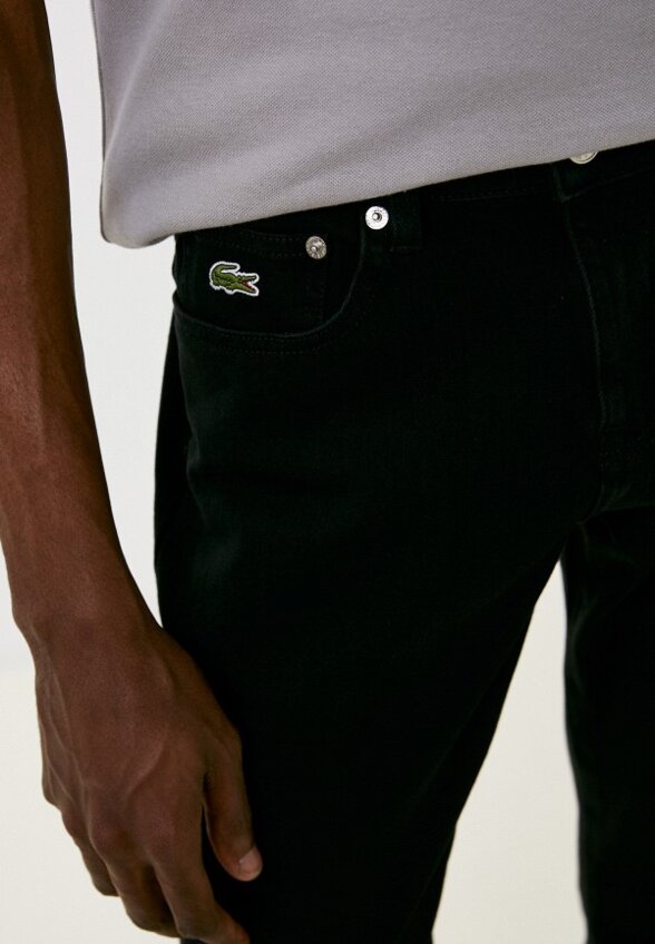 Джинсы Lacoste