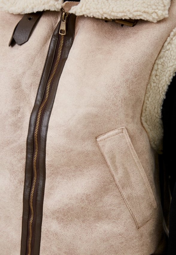 Жилет кожаный Lakressi