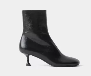 БОТИЛЬОНЫ ИЗ ГЛЯНЦЕВОЙ КОЖИ