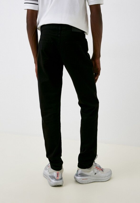 Джинсы Lacoste