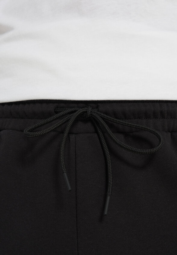 Брюки мужские PUMA Ess Logo Lab Execution, Черный