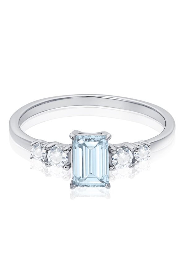 Серебряное кольцо ЧИСТОТА с небесно-голубым топазом и фианитами MIE