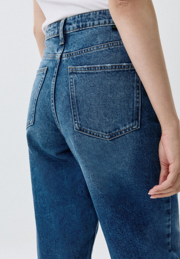Джинсы Tapered