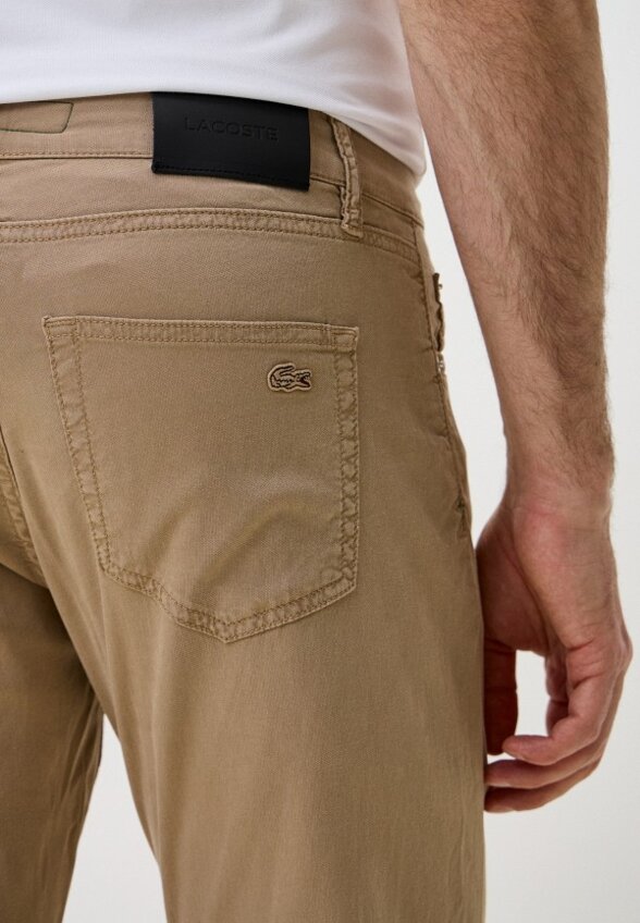 Джинсы Lacoste