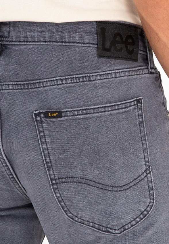 Джинсы Lee