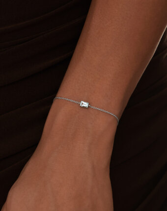 Серебряный браслет ЧИСТОТА с небесно-голубым топазом Багет MIE женщинам