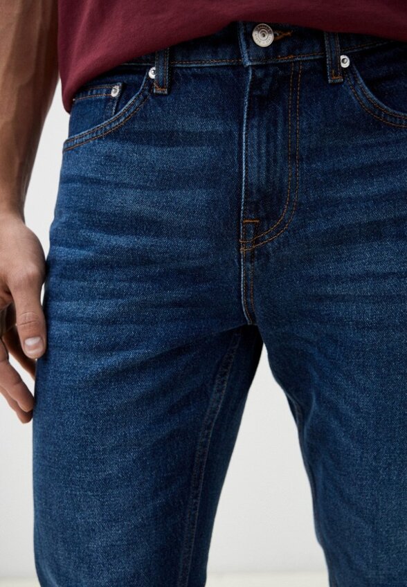 Джинсы Lacoste