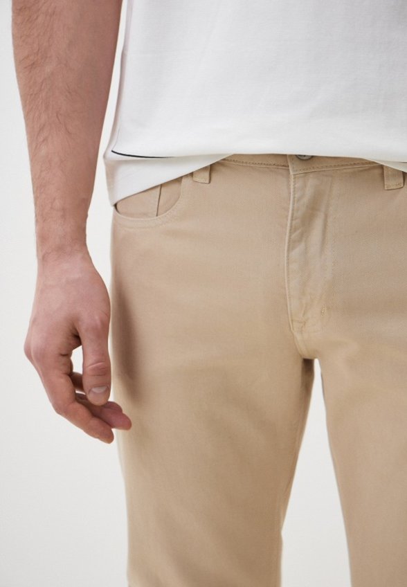 Джинсы Mossmore