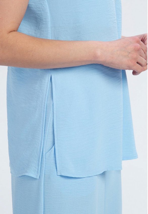 Топ Victoria Veisbrut