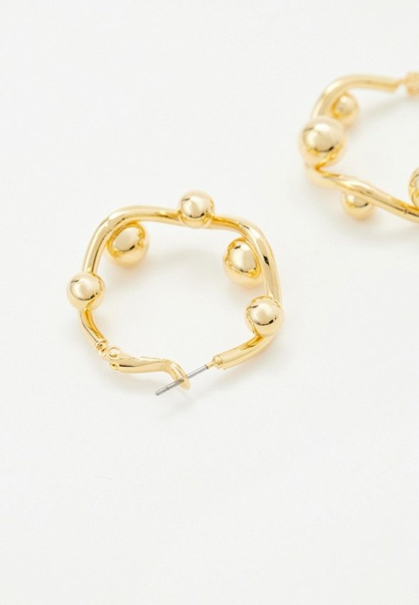 Серьги Free Form