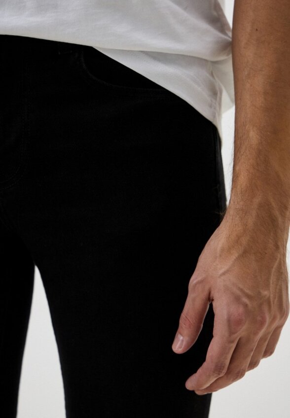 Джинсы Lacoste