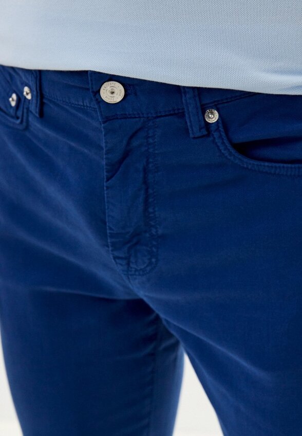 Джинсы Lacoste