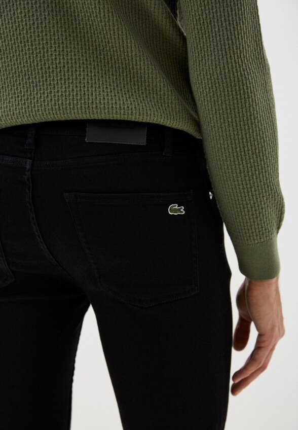 Джинсы Lacoste