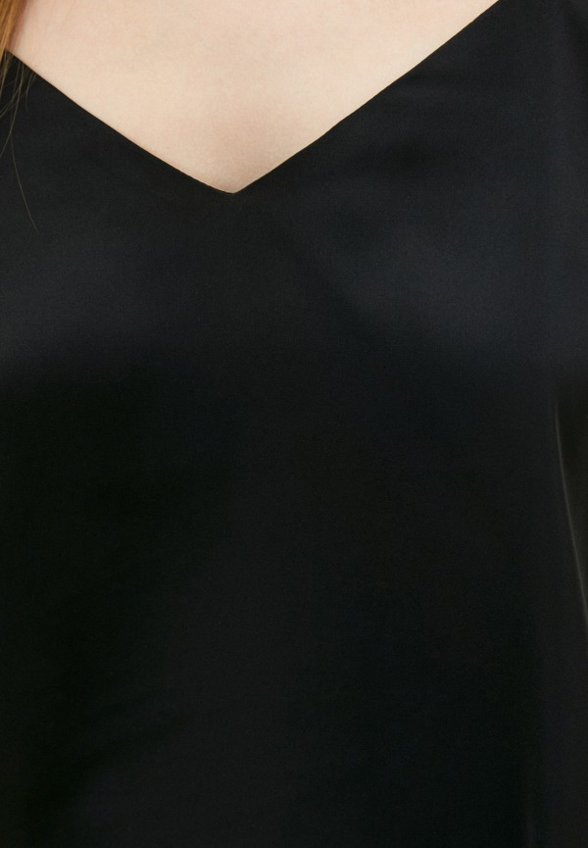 Топ Christina Shulyeva