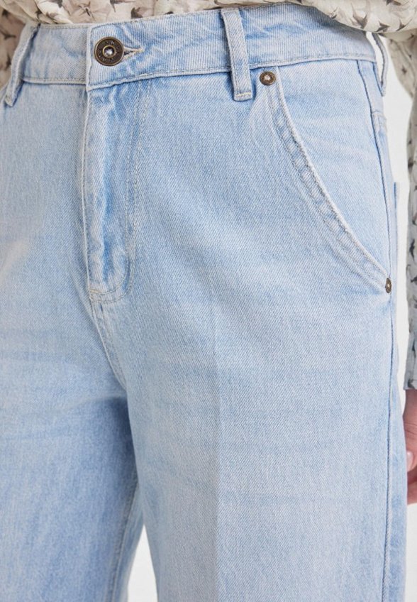 Джинсы N.O.M.I