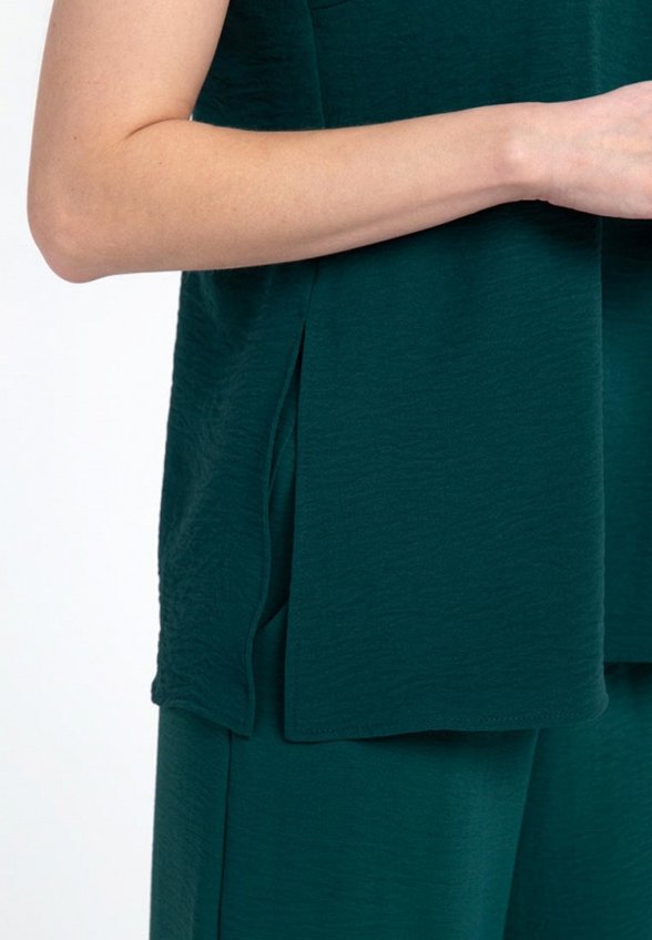 Топ Victoria Veisbrut