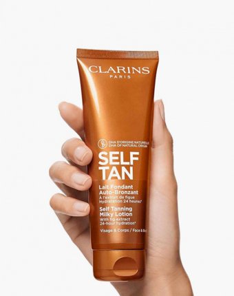 Молочко с эффектом загара Clarins женщинам