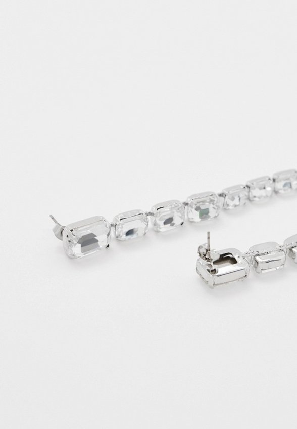 Серьги Free Form