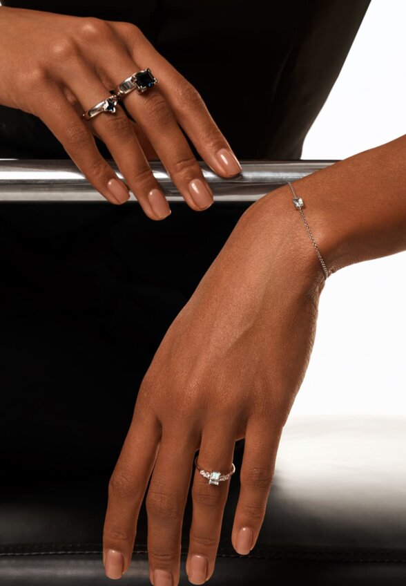 Серебряное кольцо ЧИСТОТА с небесно-голубым топазом и фианитами MIE