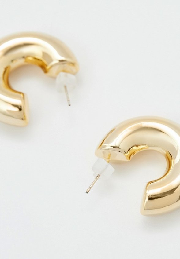 Серьги Free Form