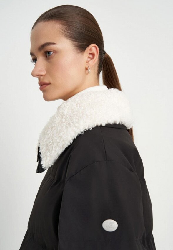 Пуховик Finn Flare