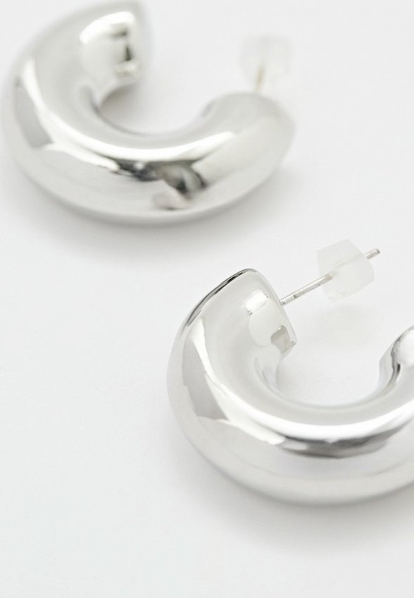 Серьги Free Form