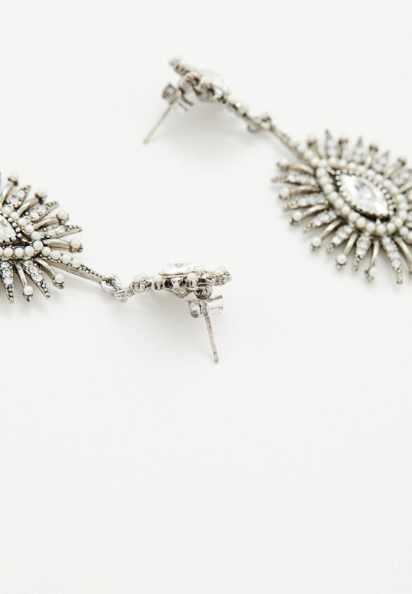 Серьги Free Form