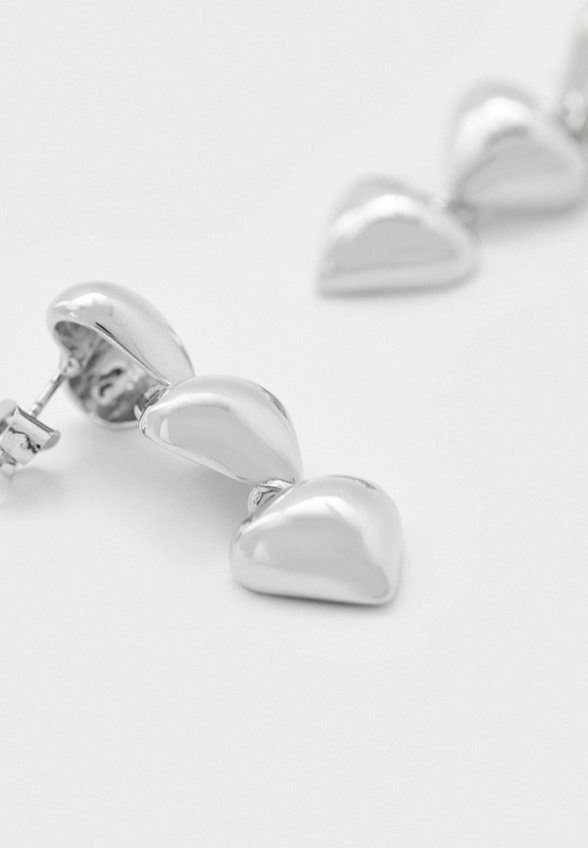 Серьги Free Form