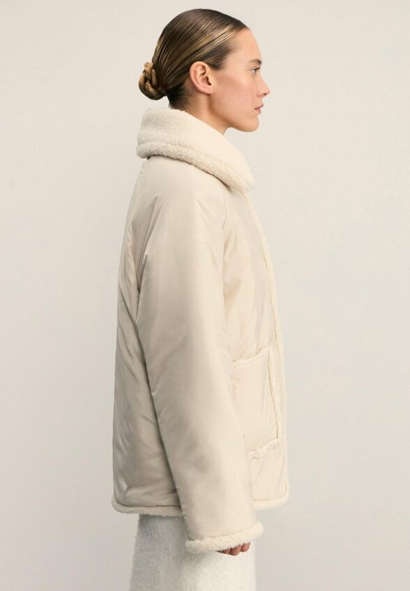 Пуховик Zarina