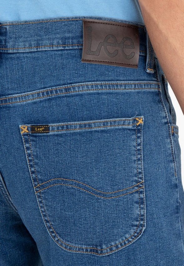 Джинсы Lee
