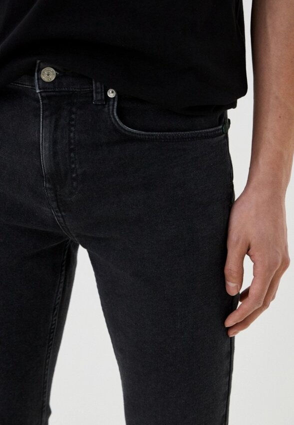 Джинсы Lacoste