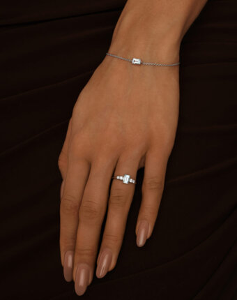 Серебряный браслет ЧИСТОТА с небесно-голубым топазом Багет MIE женщинам