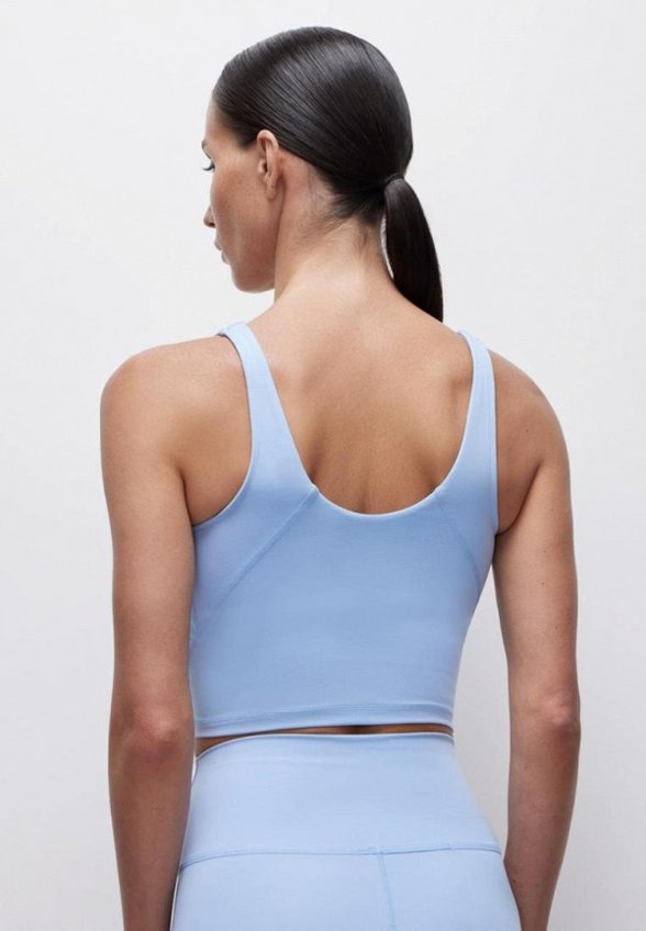 Топ спортивный belle you