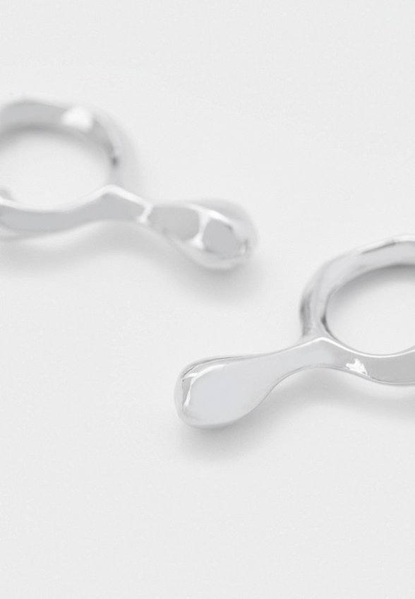 Серьги Free Form