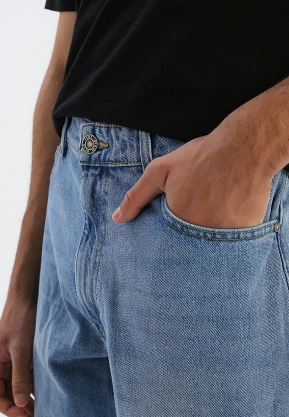 Джинсы Твое