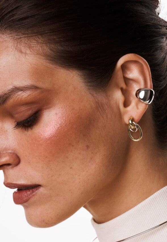 Серебряные крупные серьги-узлы в покрытии биколор MIE