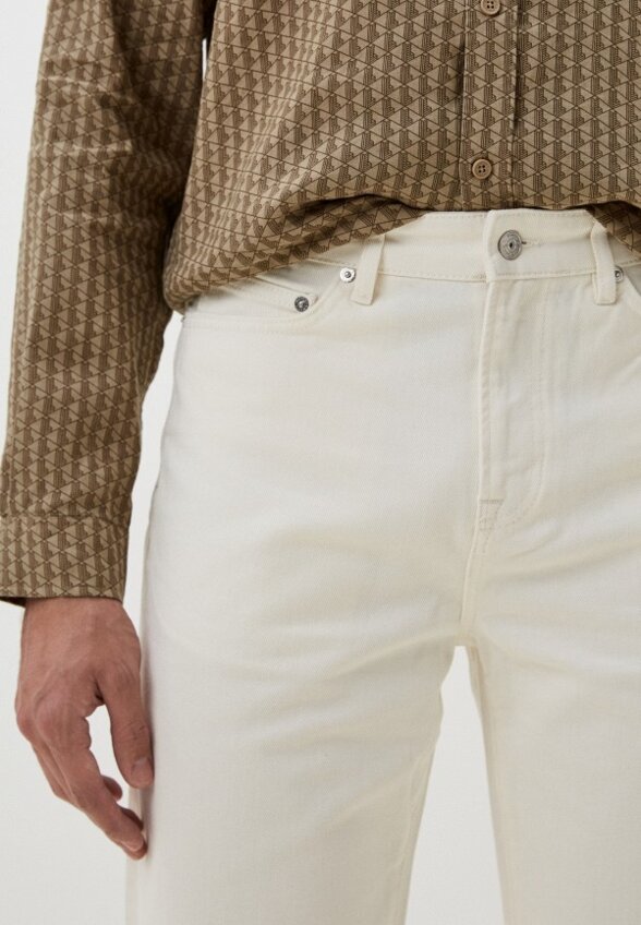 Джинсы Lacoste