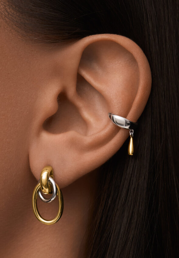 Серебряные крупные серьги-узлы в покрытии биколор MIE