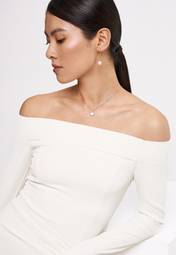 Колье и серьги Swarovski®