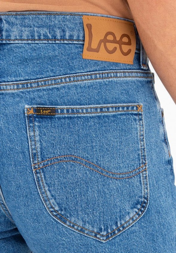 Джинсы Lee