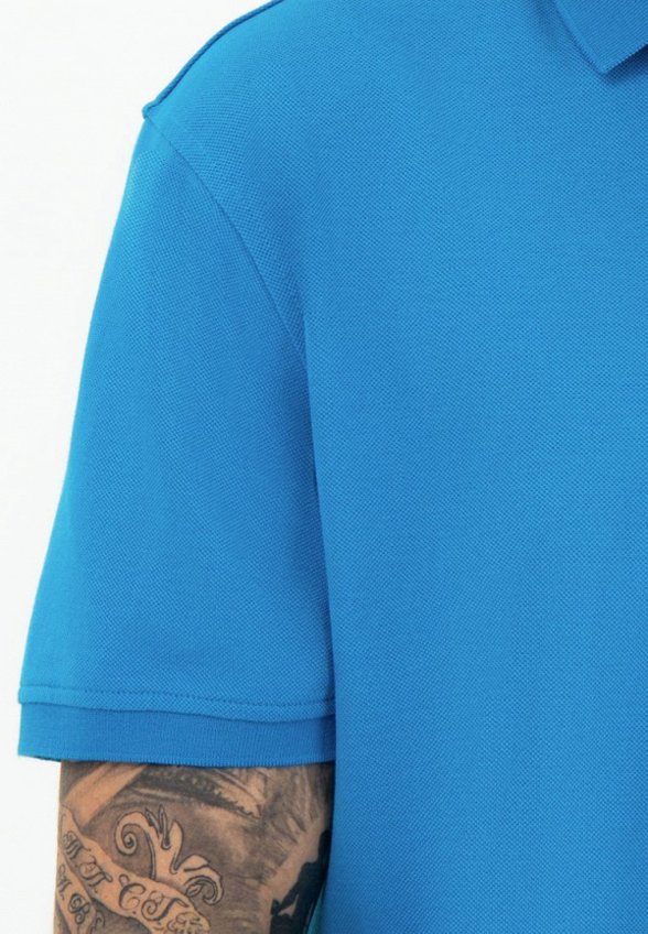 Поло Thomas Berger