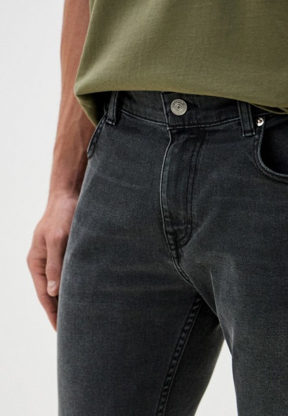 Джинсы Lacoste