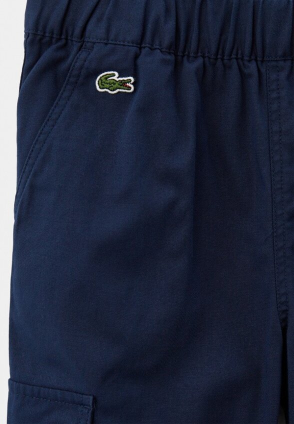Брюки Lacoste