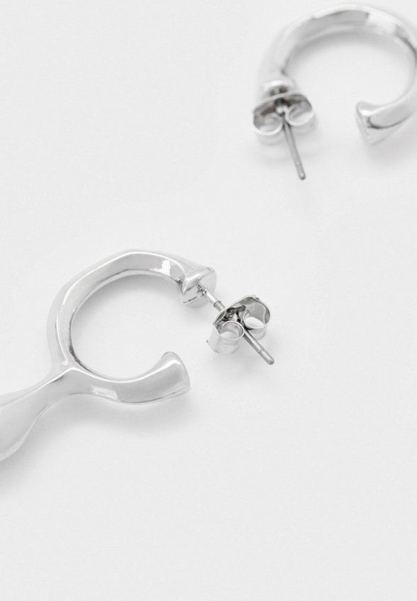 Серьги Free Form