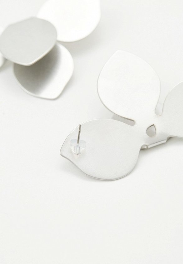 Серьги Free Form