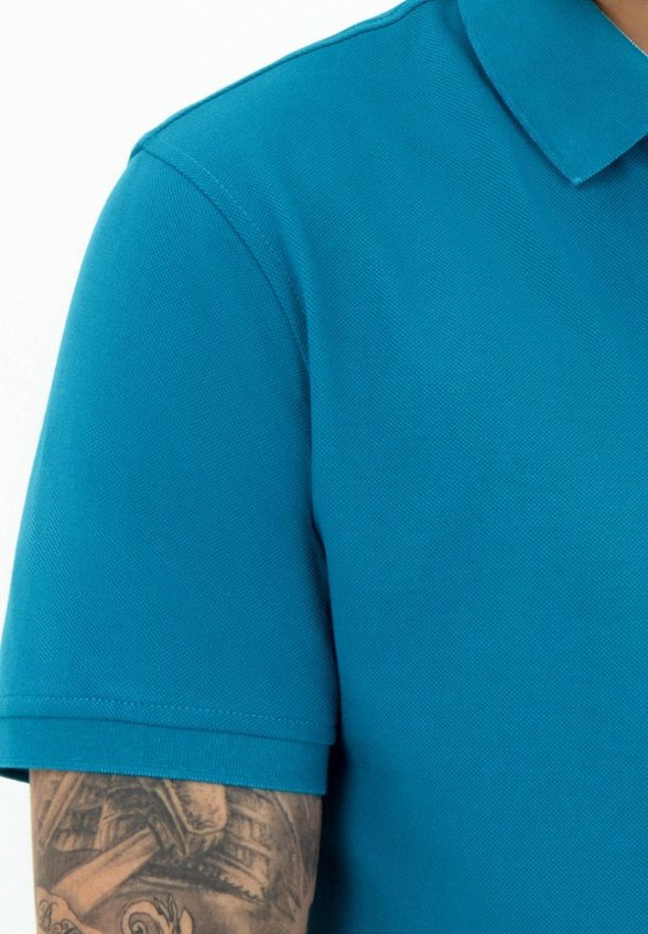 Поло Thomas Berger